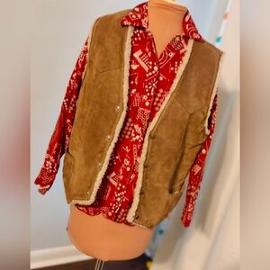 Sherpa vest suede cozy minimalist clean lines toasty fire pit chic stash pockets